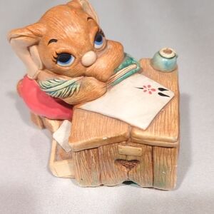 Boswell.  Whimsical Figurine with Red and Brown Accents